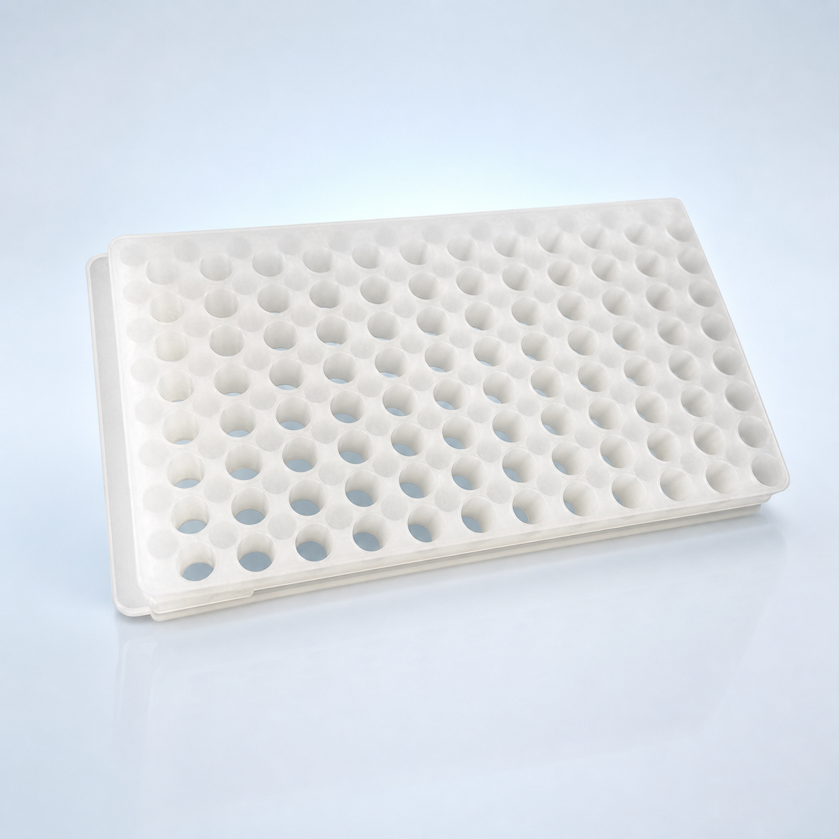 96-well white double-sided microcentrifuge tube rack on an icy blue lab background
