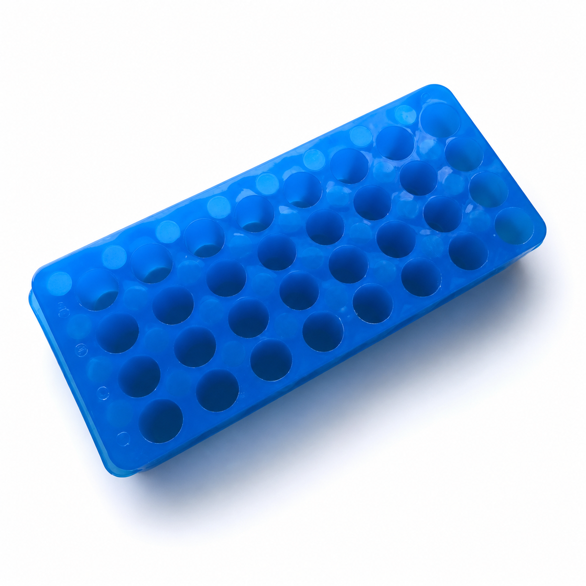 Double-sided microcentrifuge tube rack organizing small laboratory tubes on a clean bench