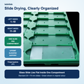 Glass microscope slide lying flat in one numbered compartment of a green polypropylene drying tray