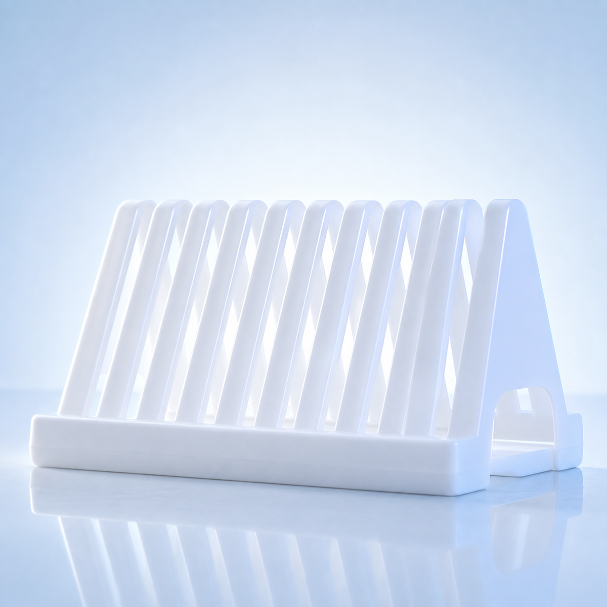 White laboratory slide and tube drying rack on a clean blue-lit laboratory bench